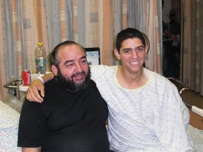 Izzy Ezagui and his father in hospital.