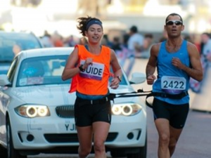 Gadi Yarkoni runs marathon with guide