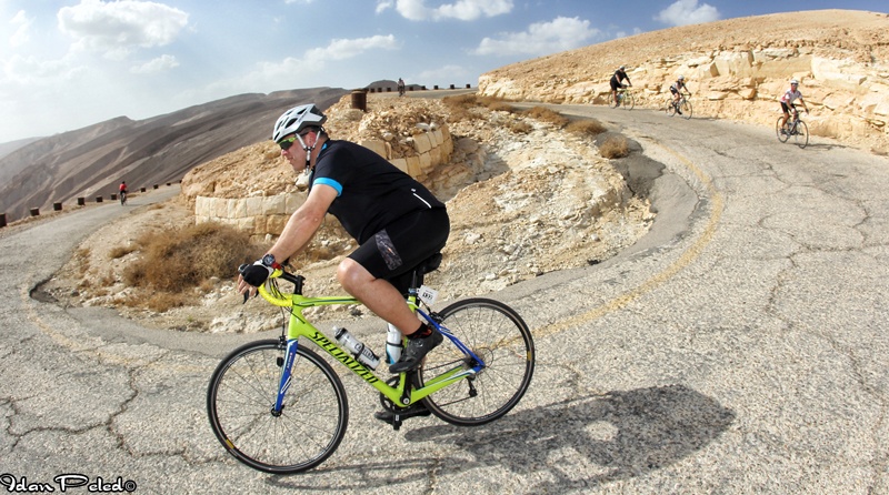 Cantor Alex Stein rides bike on Courage in Motion